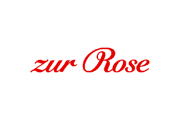 Logo mit dem Schriftzug 'zur Rose' in roter Schrift auf weißem Hintergrund.